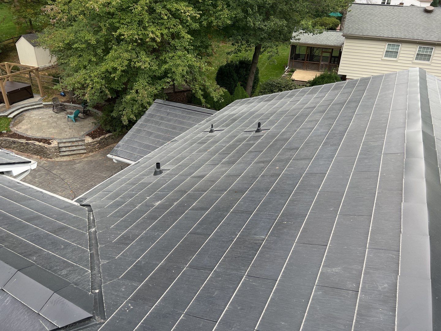 Tesla Solar Roof Replacement using Tesla Solar Roof V3 Tiles by American Home Contractors