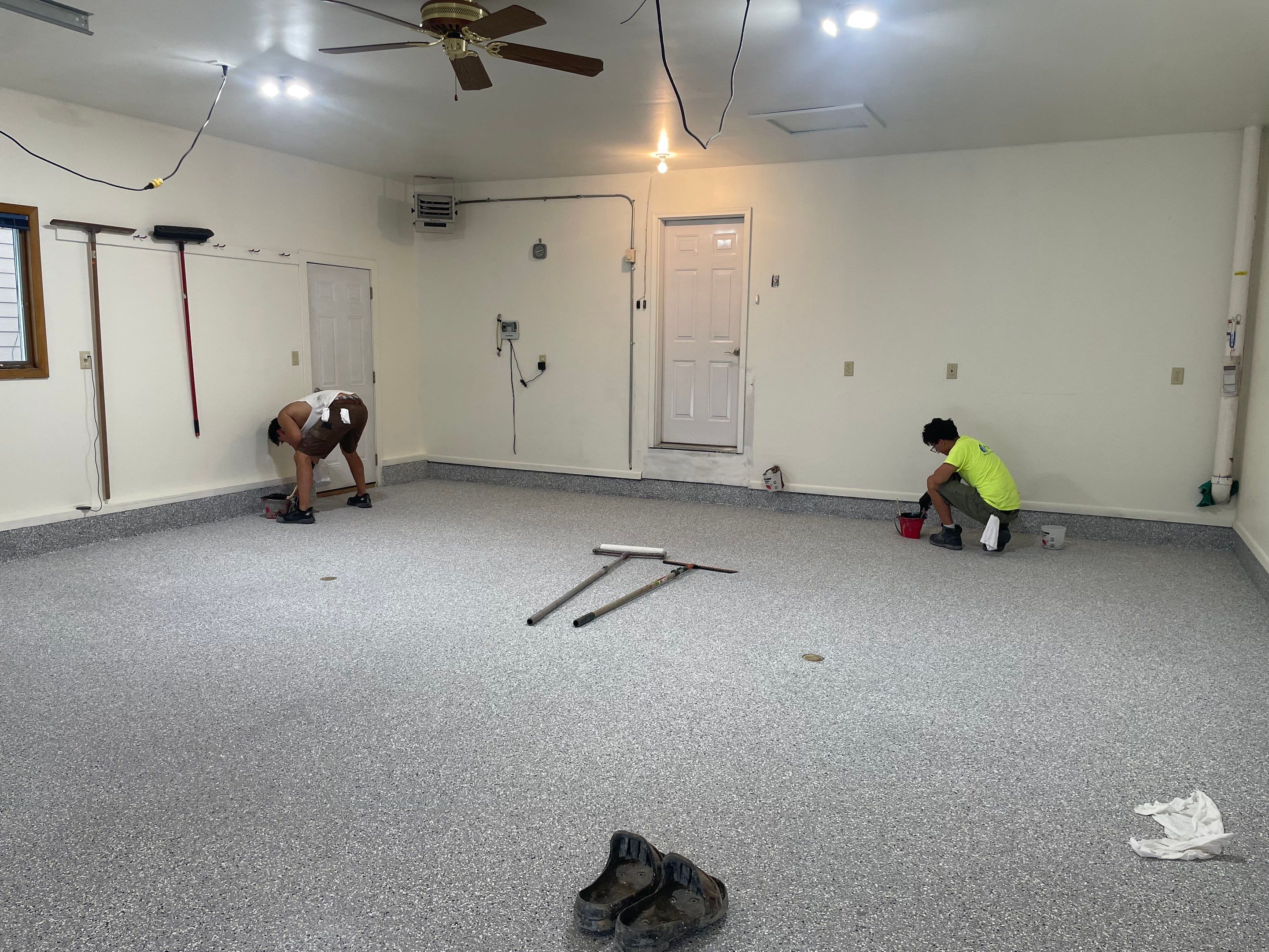 Madison Garage Concrete Coating with Feather Grey Speckle Finish by Select Painting, Coatings & Garage Cabinets