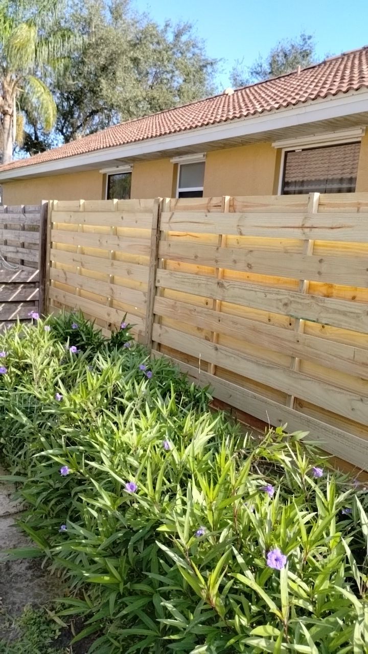 Wood Fence Installation using Shadowbox Wood Fence by Asap fence and gates, LLC