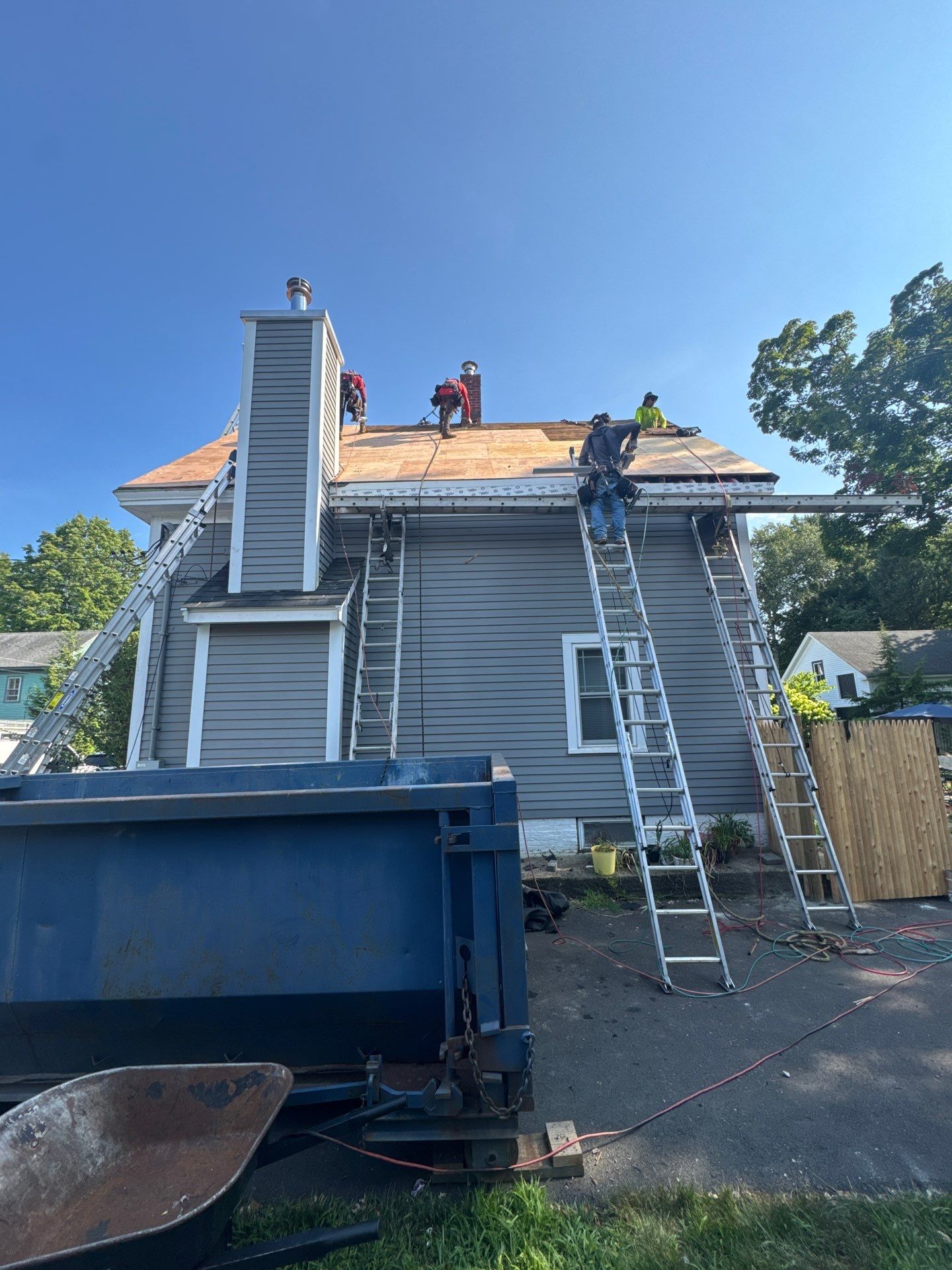 Full Roof Replacement + Custom Gutter Install | Onyx Black Finish by Mighty Dog Roofing of Greater Middlesex County