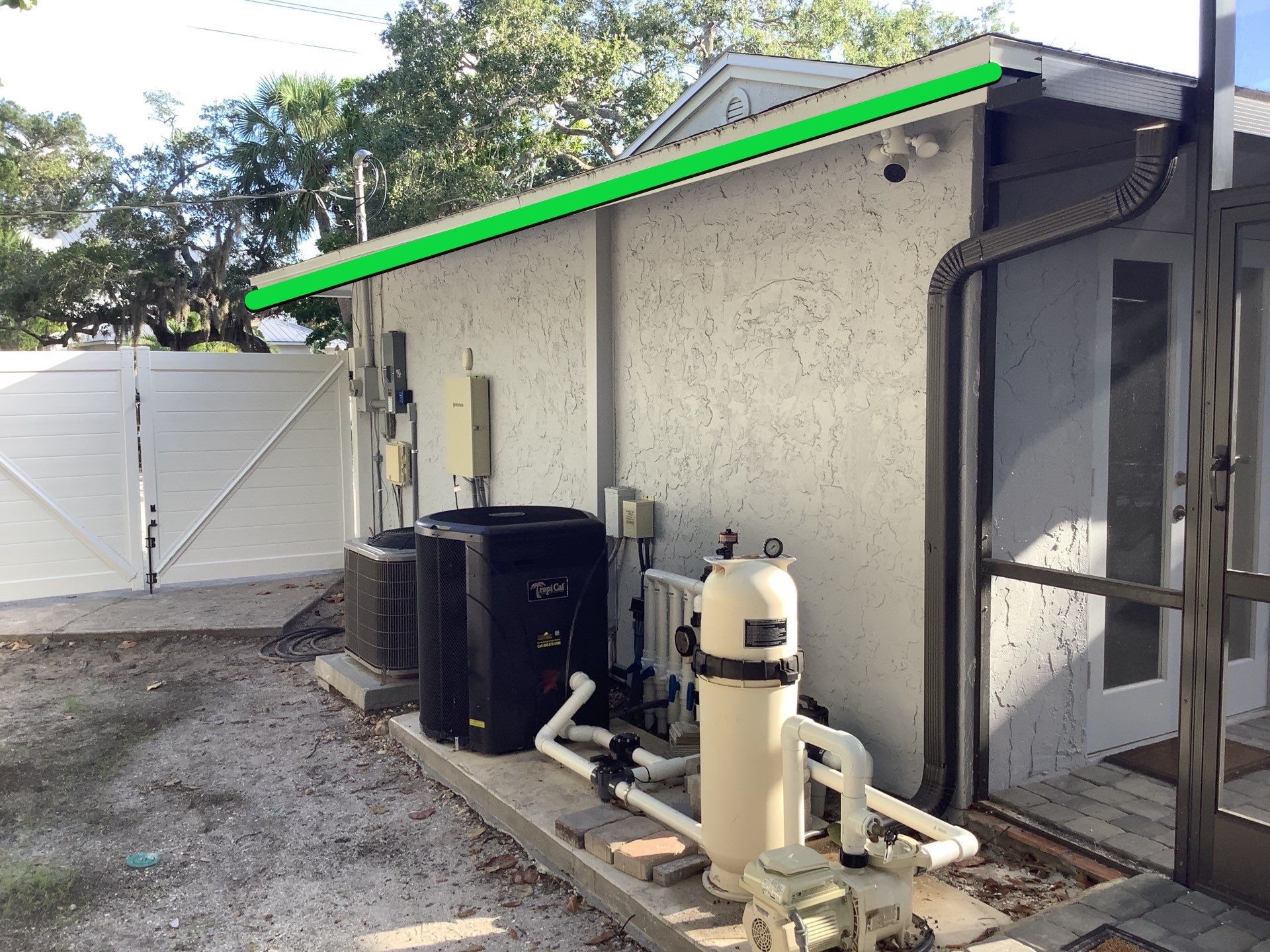Black Seamless Gutters Installation in Siesta Key FL by Gutter Professors