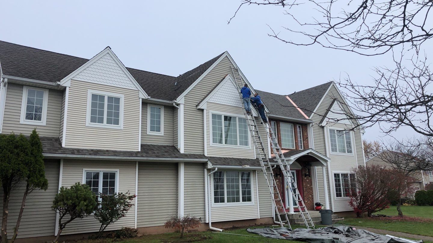 Commercial Roofing Installation using Owens Corning TruDefinition driftwood by A Plus Exterior