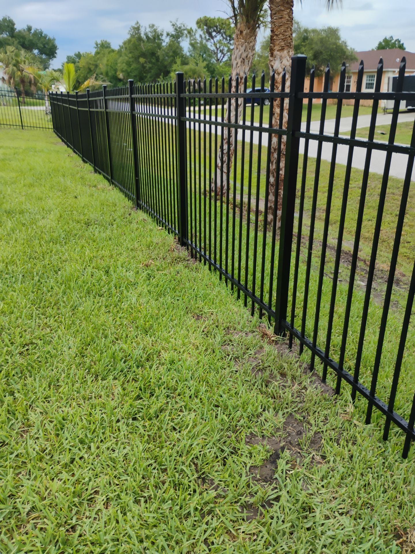 Black Aluminum Spear Top Picket Fence Installation in Englewood by True Fence LLC
