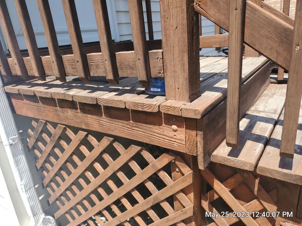 Wood cleaning and staining using Armstrong cloark oil stain by Northern Power Washing LLC.