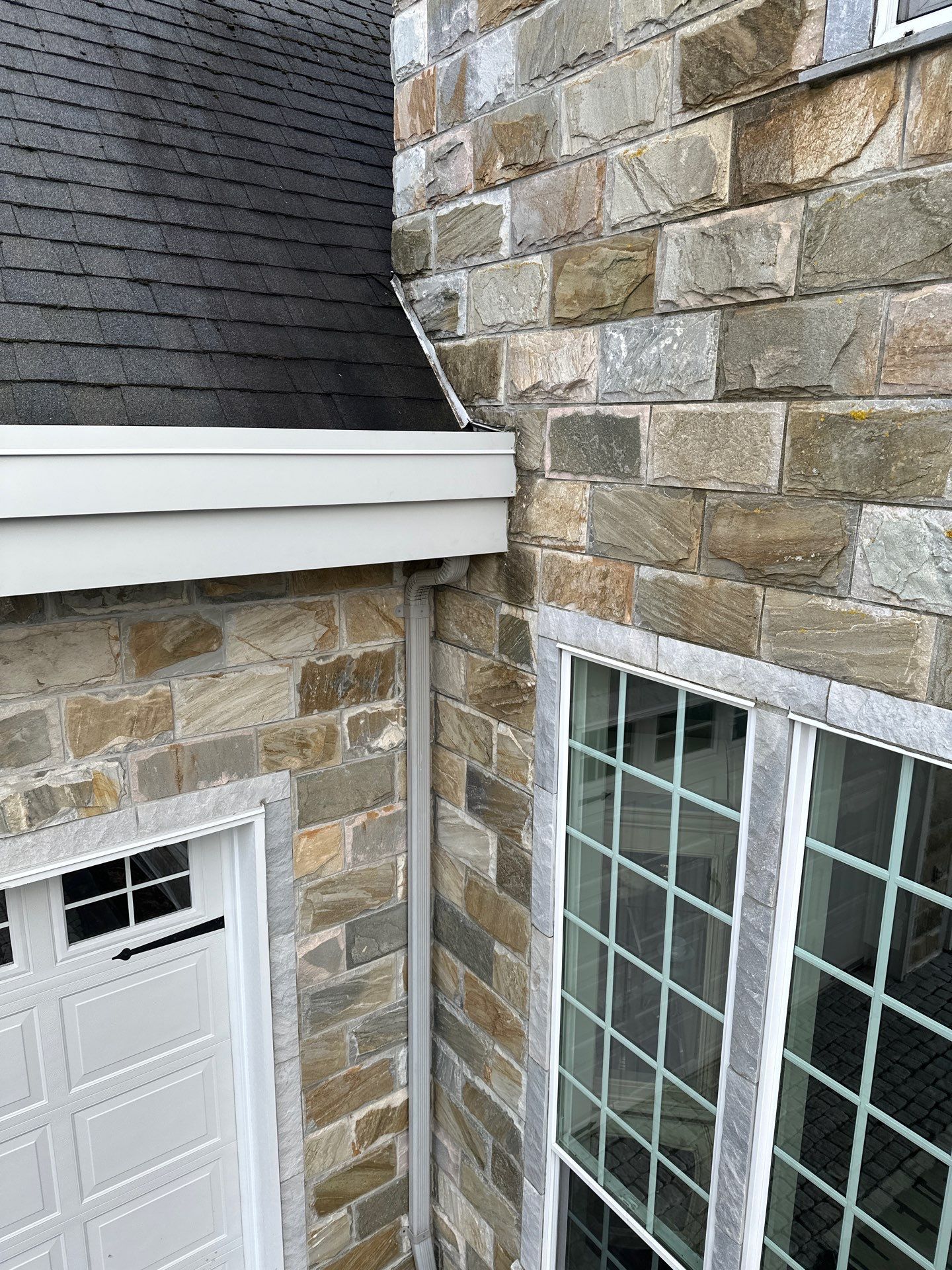 Residential Re-Roof using 26 GA Fascia Color White White by Top Notch Roofing Inc