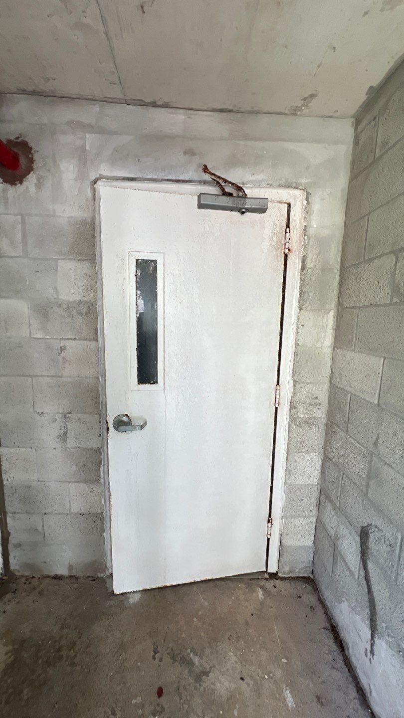 Commercial Stairwell Door Replacement & Hollow Metal Door Retrofit – Pompano Beach High-Rise by The Door Doctor of South Florida, Inc.