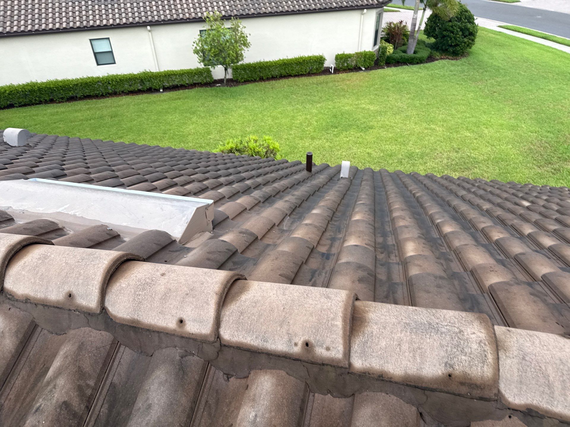 Concrete Tile Roof, Paver Driveway & Lanai Cleaning – Artisan Lakes Esplanade, Palmetto, FL by Sunshine AquaWash