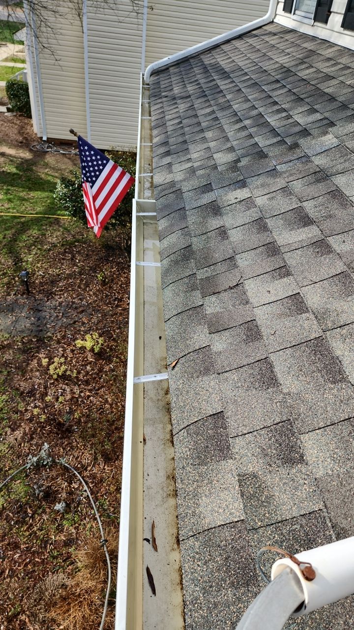 Gutter Cleaning using water by G&H Home Tech Pros LLC