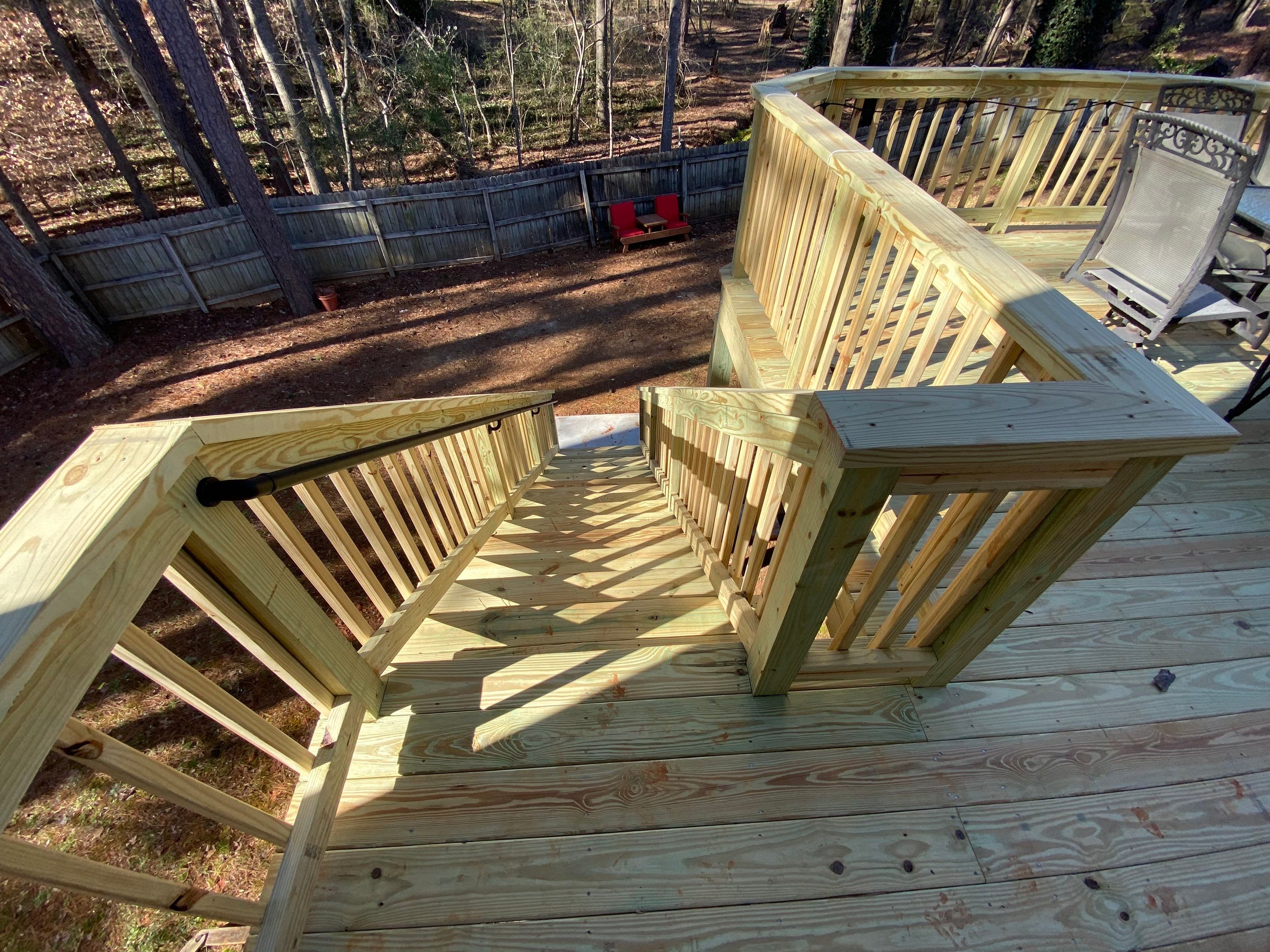 Elevated Pressure-Treated Wood Deck Replacement and Staircase in Duluth by Swift Home Renovations