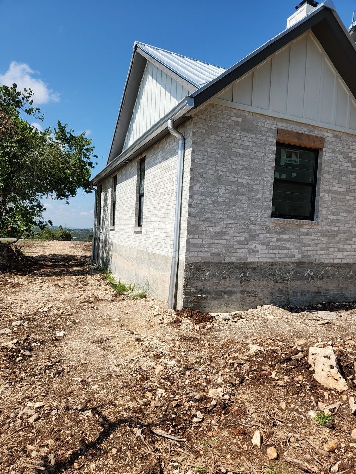 Residential Rainwater Collection System - Pioneer 40K gallon water tank in Mangrove Green by Hill Country Rain Water
