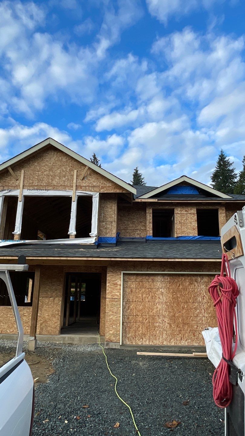 Residential Roofing Installation using OC Oakridge shingles by Top Notch Roofing Inc