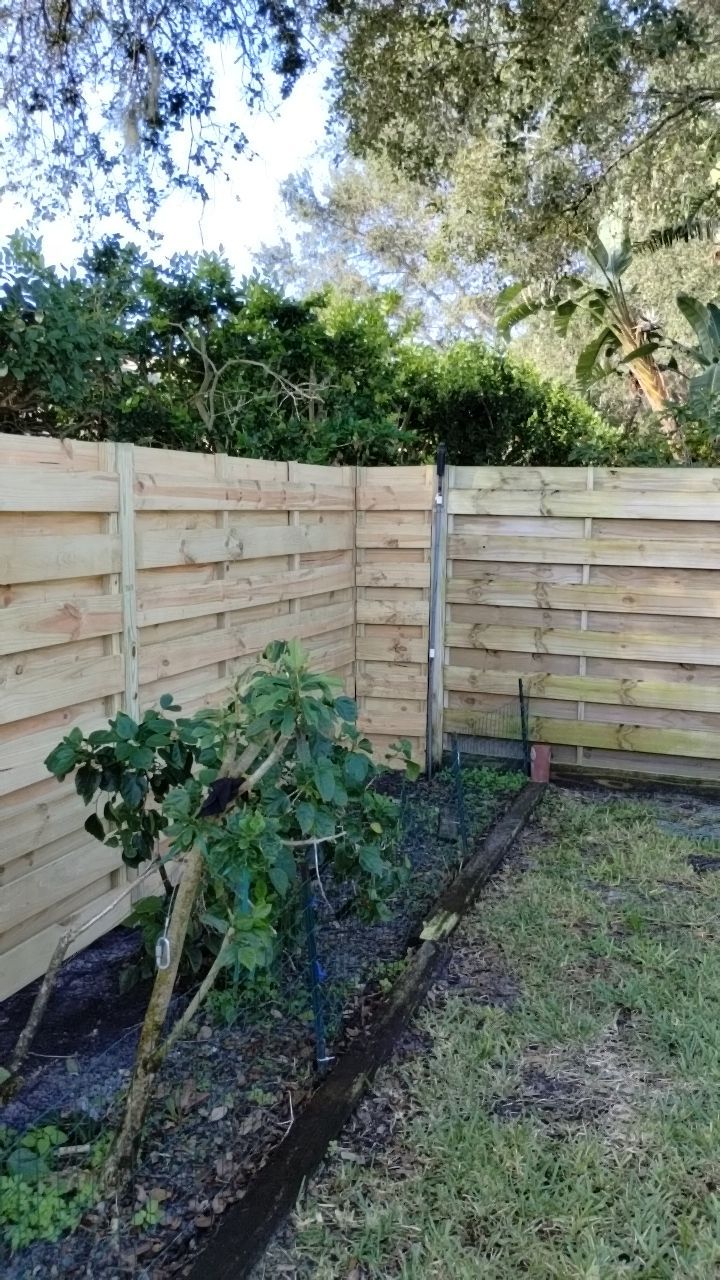 Wood Fence Installation using Shadowbox Wood Fence by Asap fence and gates, LLC