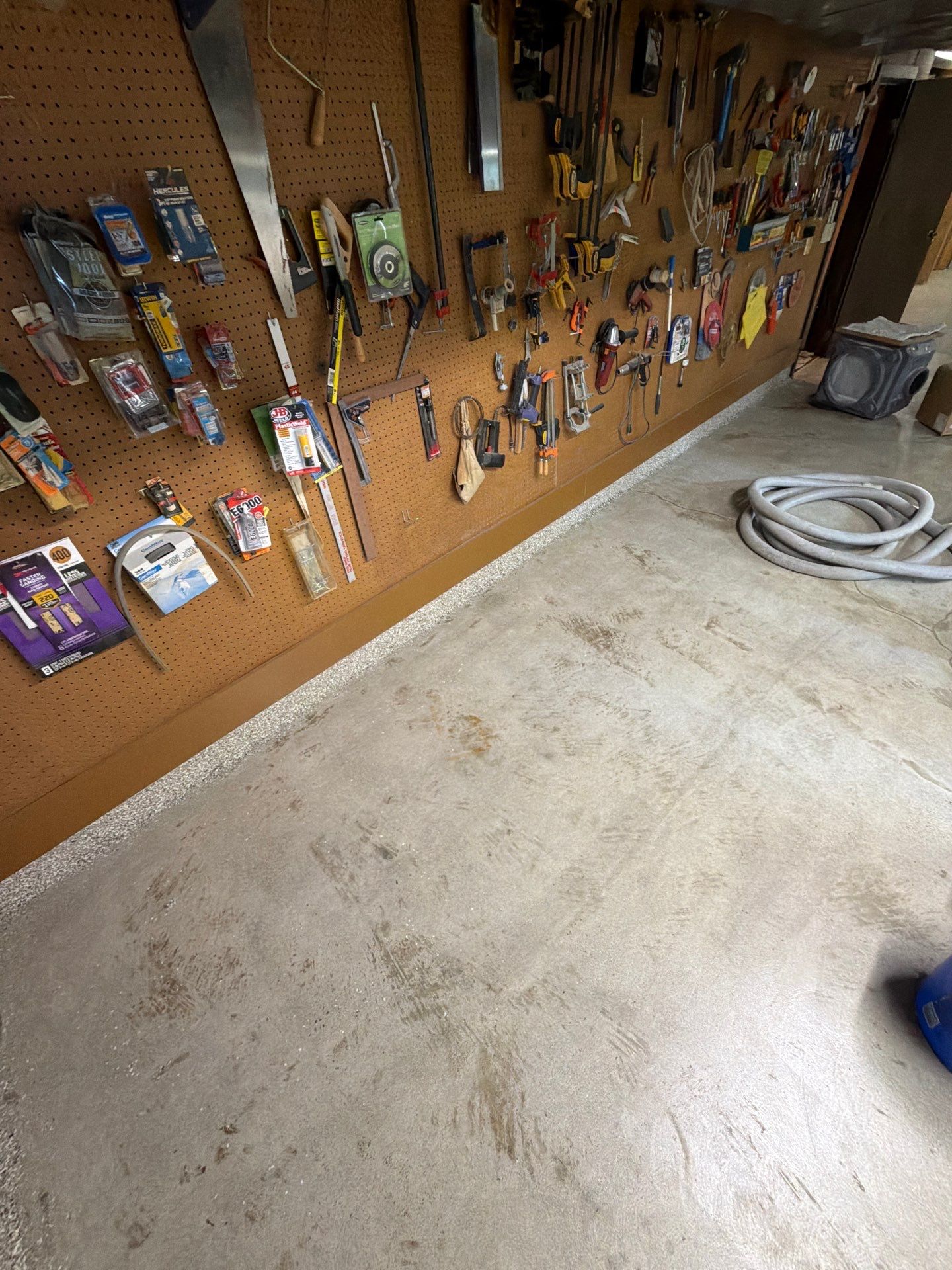 Full Basement and Garage Epoxy Flake Floor Installation in North Muskegon by Gordon Painting
