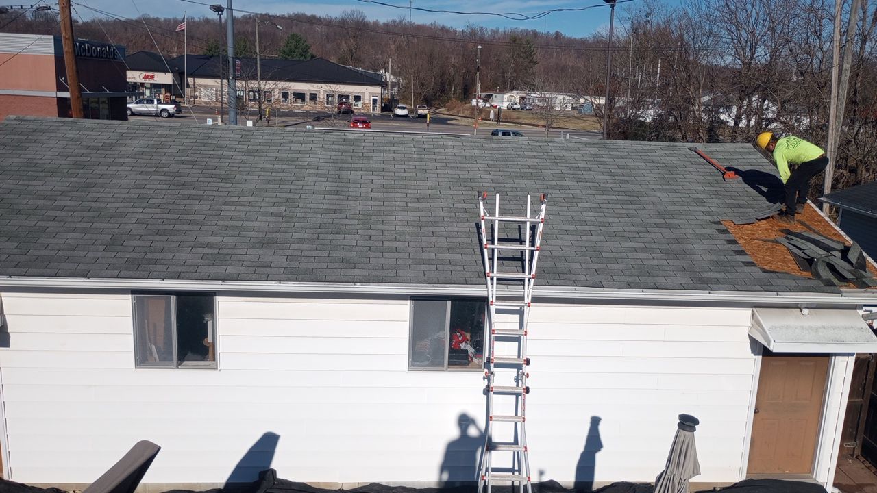 Residential Roofing Installation using Performance Shingles by Mr. Roofer
