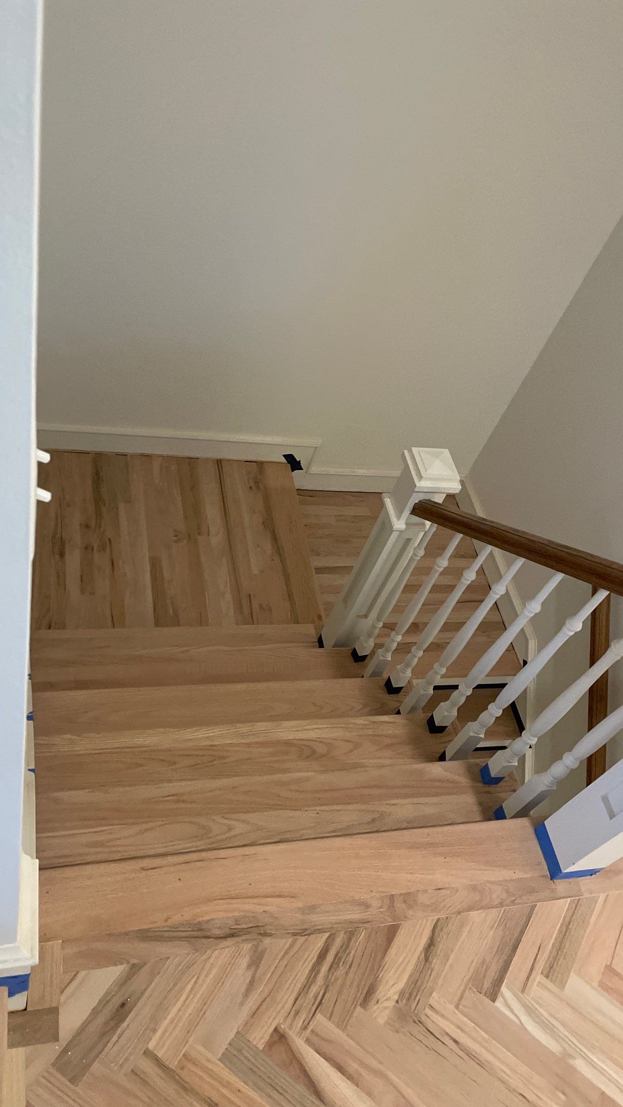Herringbone Wood Hallway and Rooms by Footprints Floors of Coastal Carolina