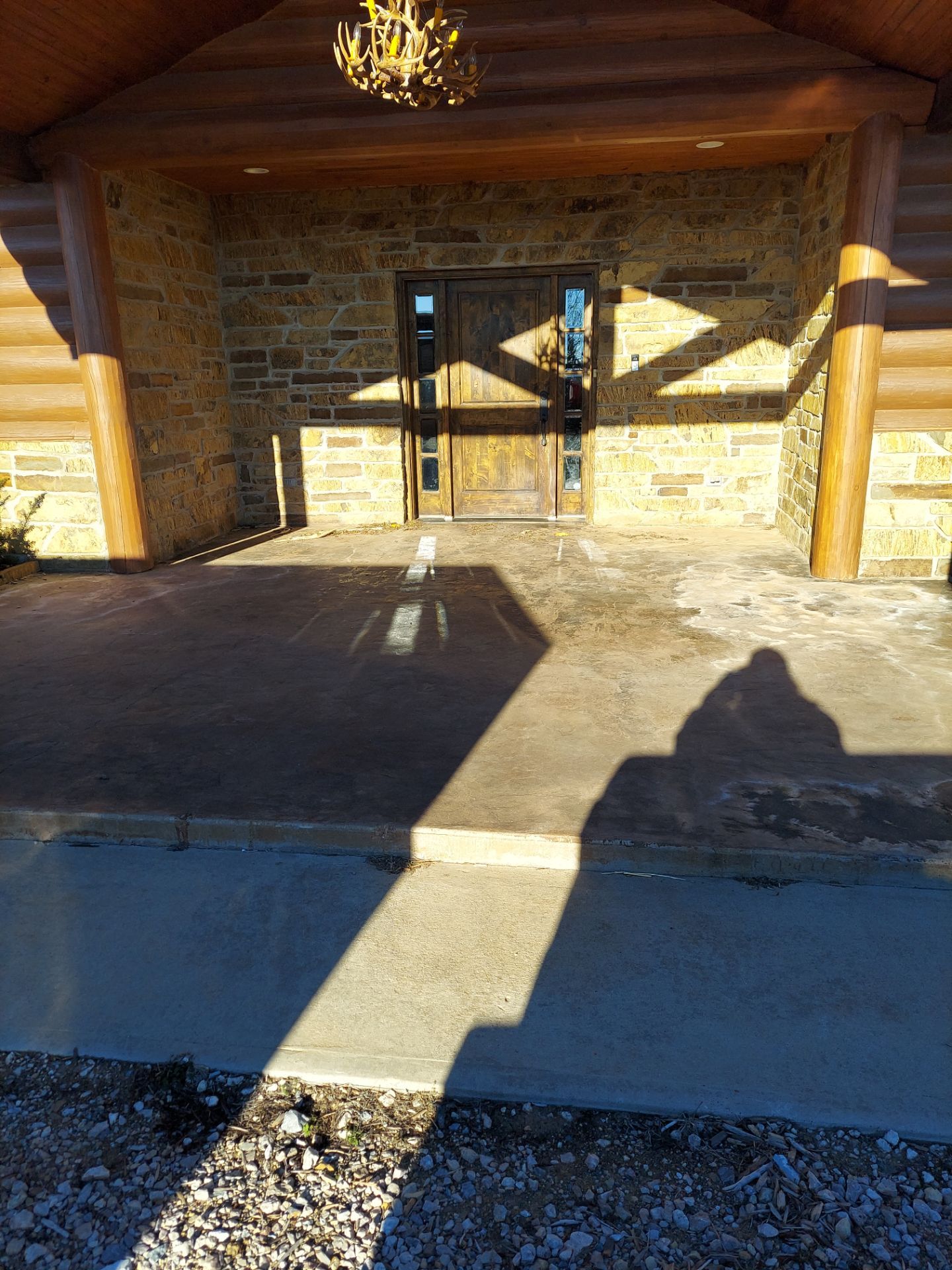 Patio Coating Installation with Chestnut by Copperhead Coatings