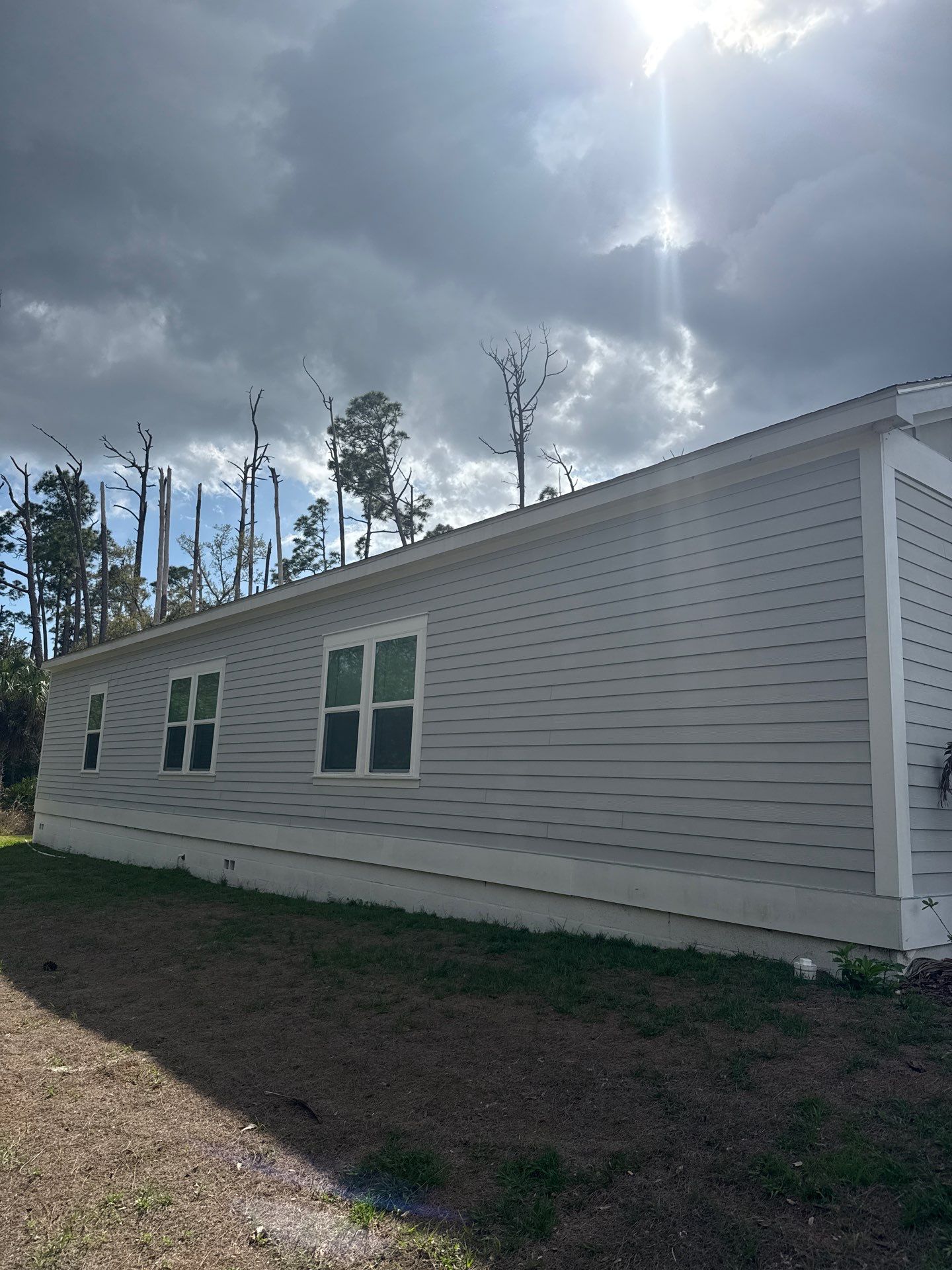 Downspout Installation using 3X4 Elbow Downspout in Port Charlotte FL by Gutter Professors