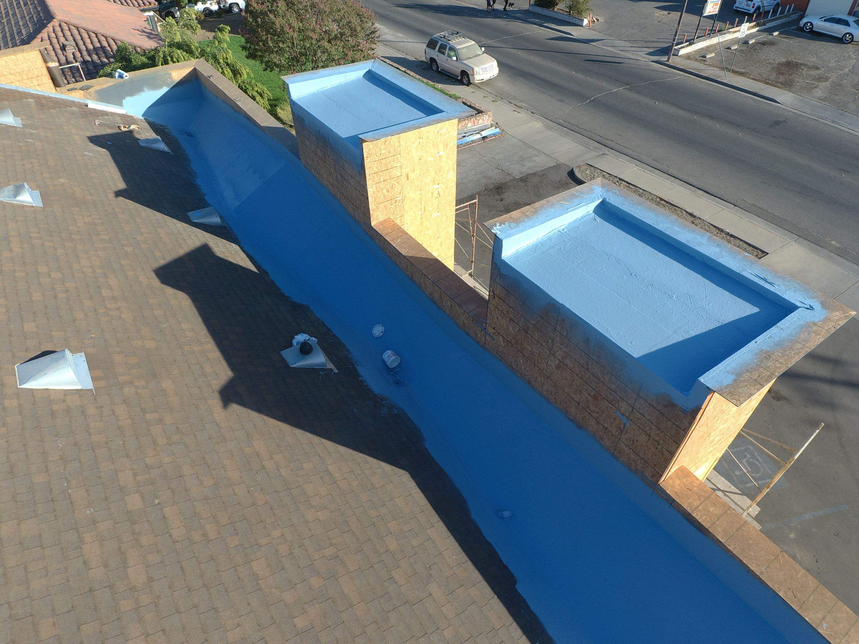 Spray foam and coatings using Conklin Benchmark/PUMA XL coatings and spray foam by Straight Edge Roofing Inc