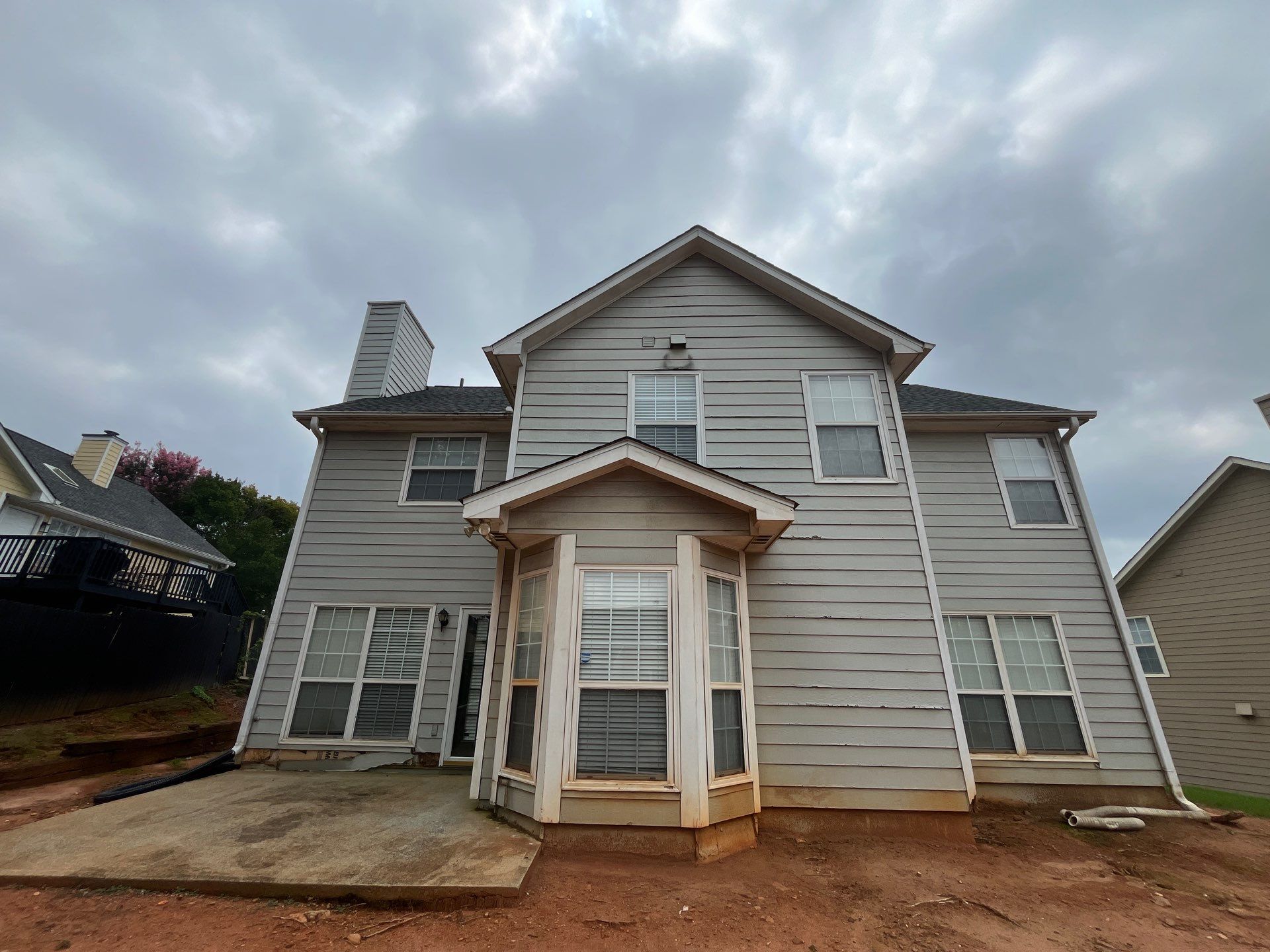 Lawrenceville, GA Full Siding Replacement, Exterior Painting, and Window Installation by Nelson Exteriors 