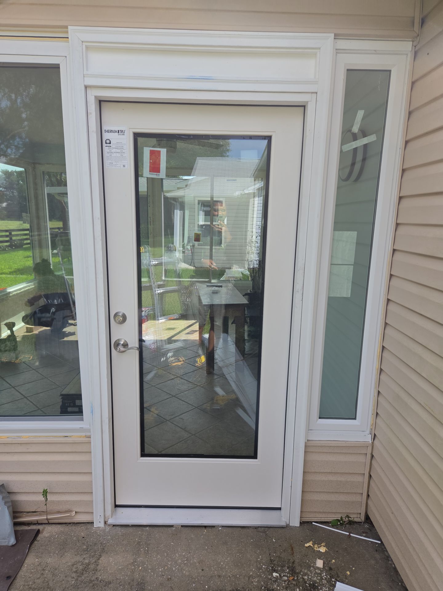 Sunroom Conversion with Alside Windows and Provia Door in The Villages by Windows & Doors Store