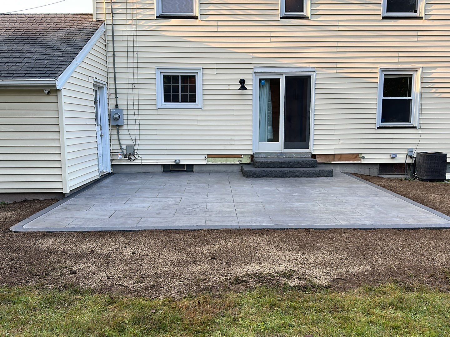 York Bluestone stamped patio by NG Masonry & Construction LLC