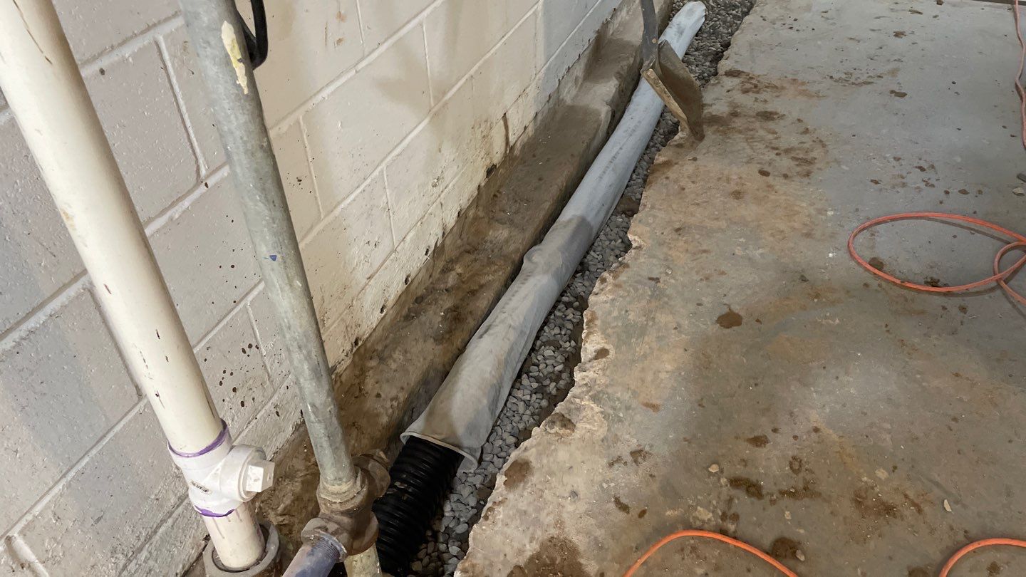 Interior Drain Tile Installation in Columbia Heights, MN by Waterproofing Northeast