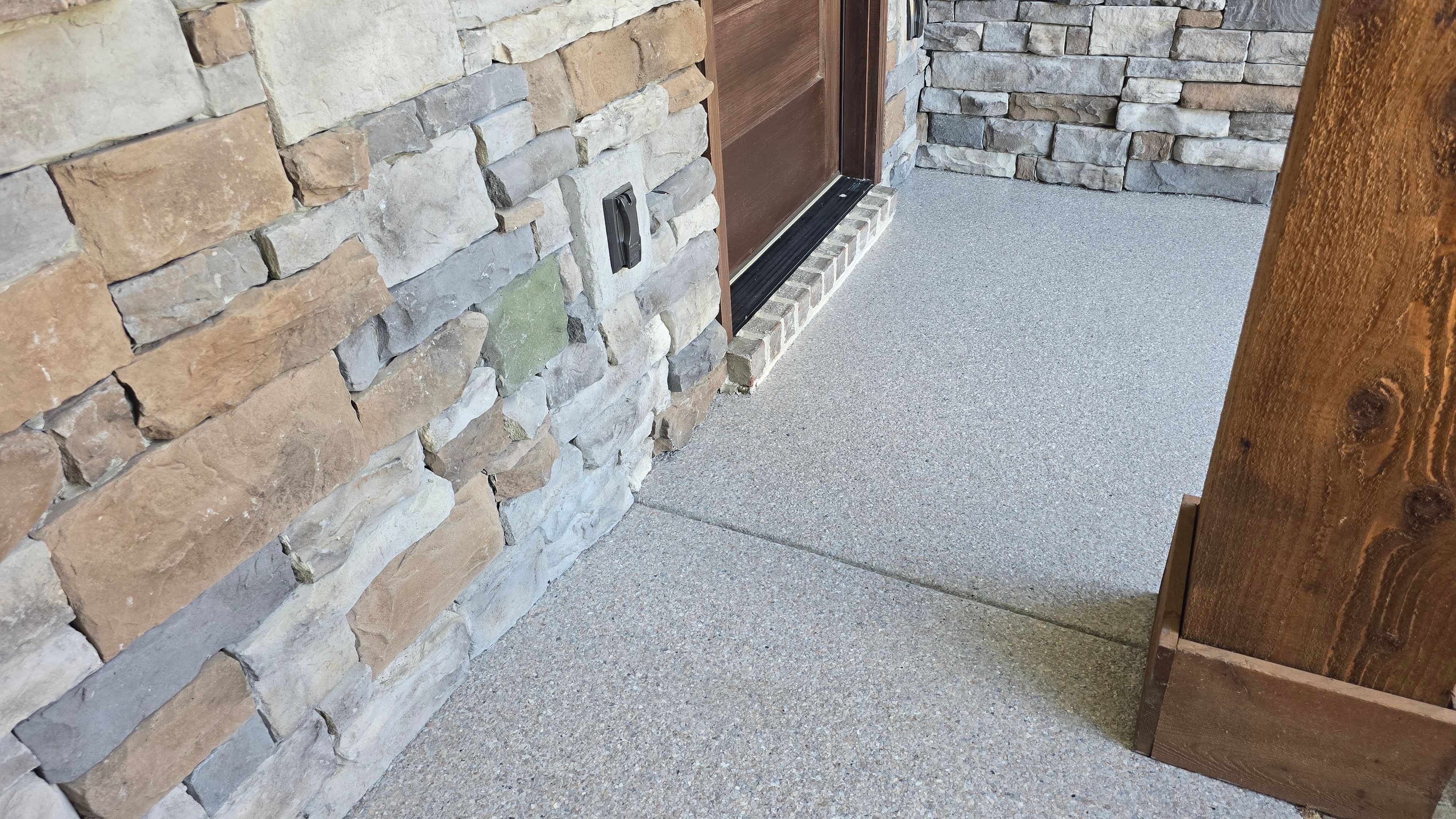 Porch & Patio Completed Using Obsidian & Pumice by Elite Floor Solutions