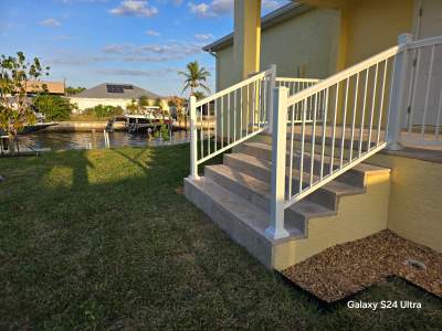 Vinyl Privacy Fence and Porch Railing Installation in Port Charlotte