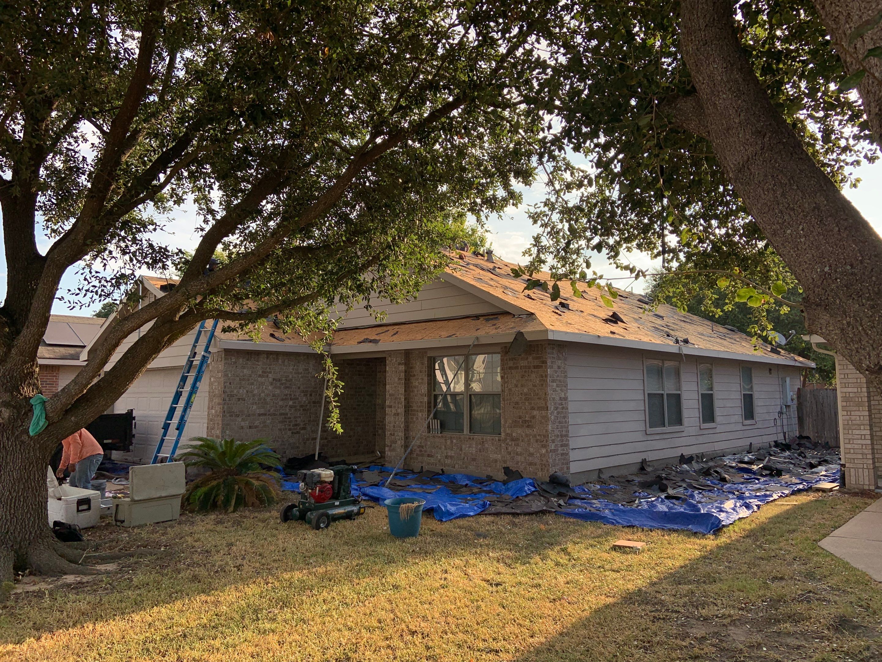 AMIG approved this roof for wind damage, fascia painting, and window work. by Roof Repair Company