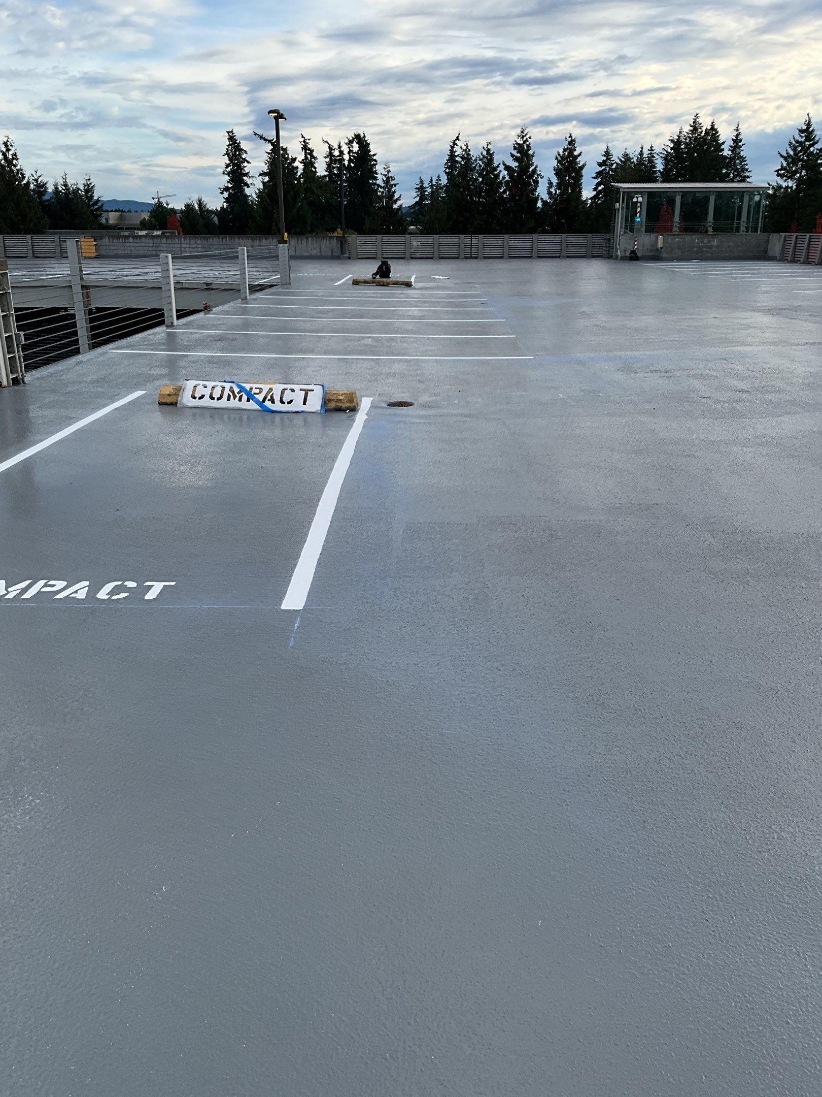 Corti Construction | Striping for Concrete Parking Lot by Jireh Asphalt & Concrete Inc 