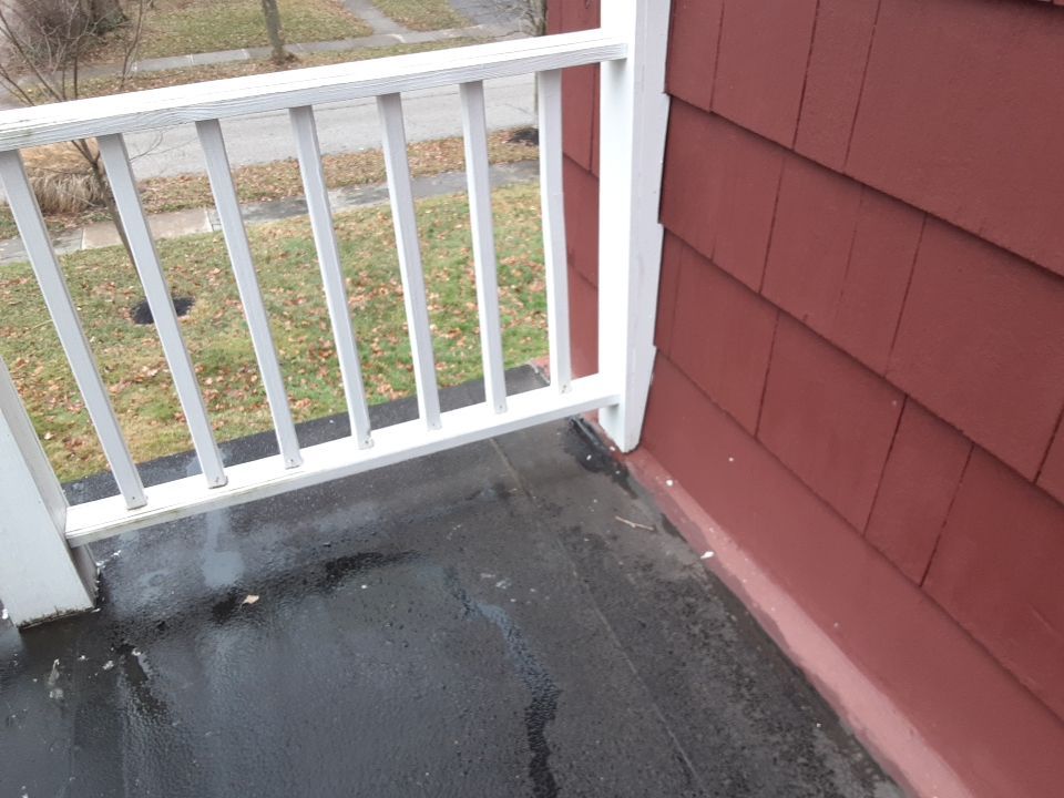 Residential Roof Replacement using Patio Roof by Absolute Roofing and Construction