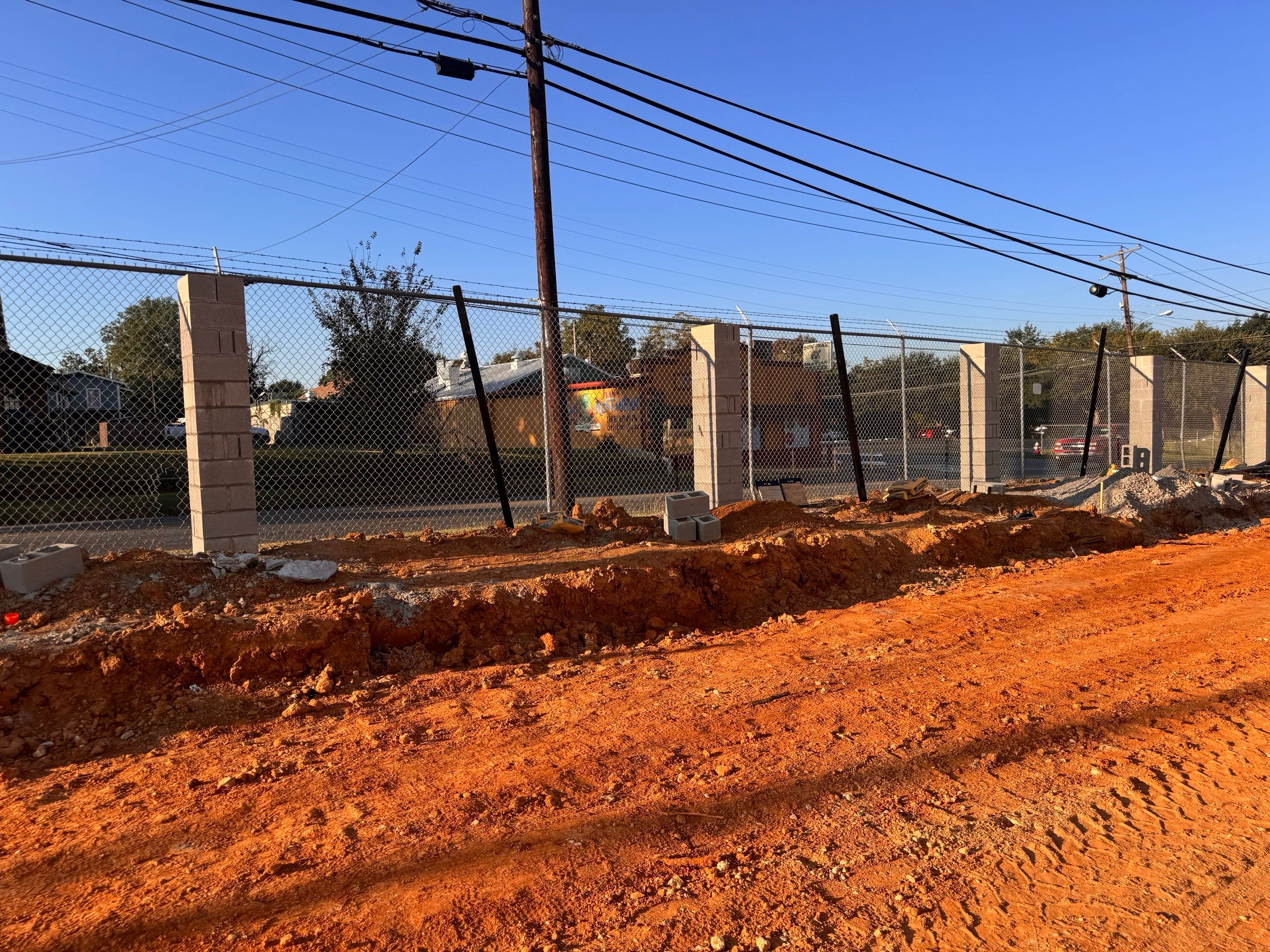 Commercial Fencing - Wrought Iron with Concrete columns by 3:16 Roofing and Construction