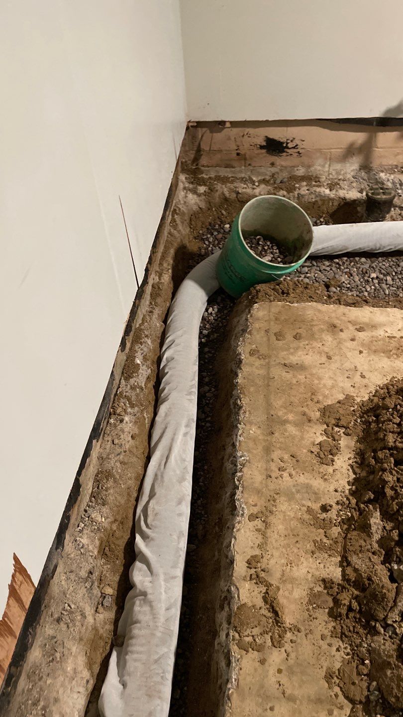 Basement Drain Tile & Sump Pump in Northeast Minneapolis by Waterproofing Northeast