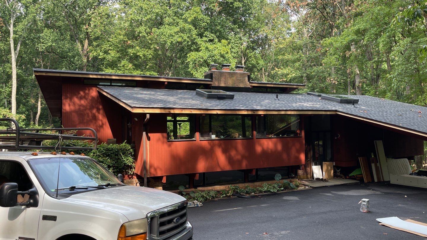Deckhouse Roof Replacement by American Home Contractors