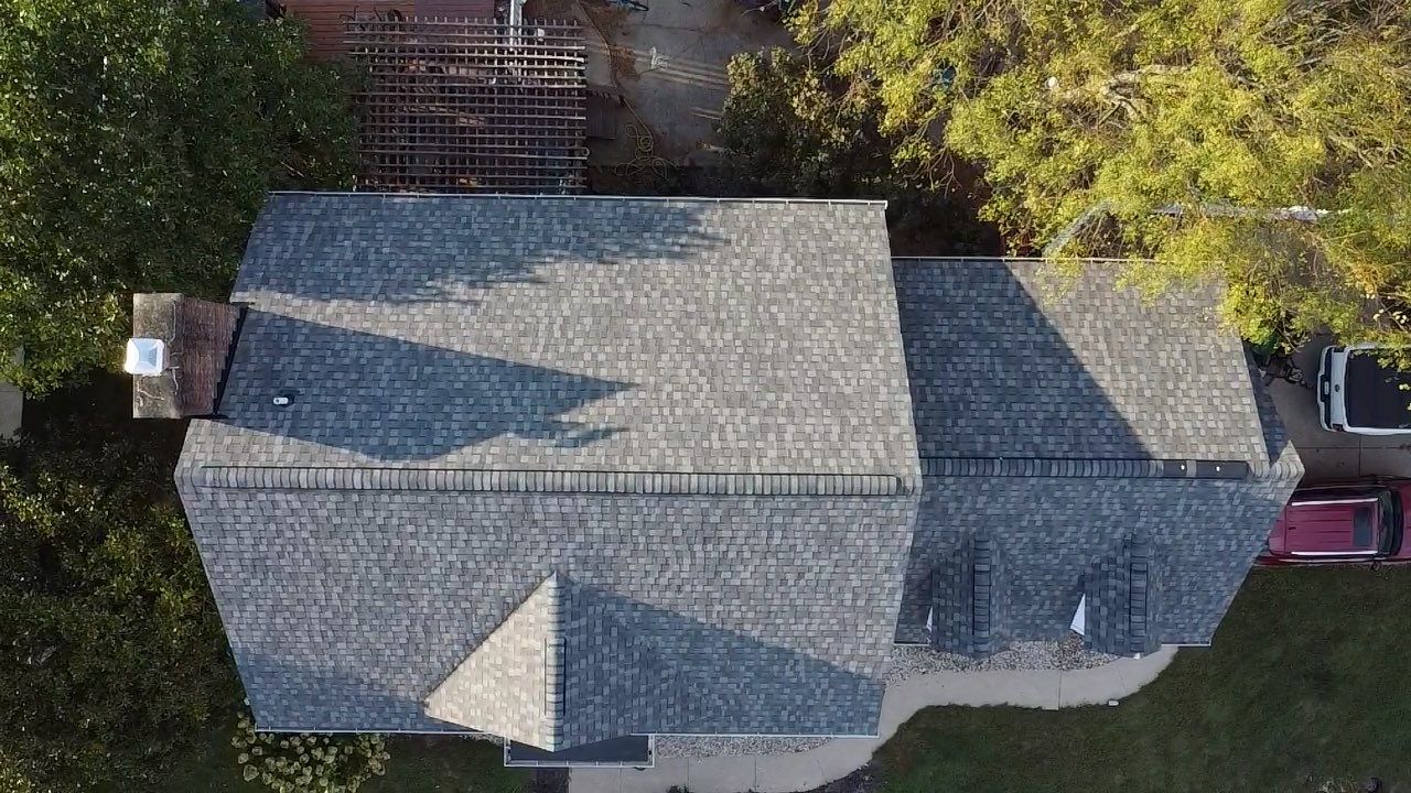 Landmark Pro, Siding, and 6" Gutters by Fahey Roofing + Contracting