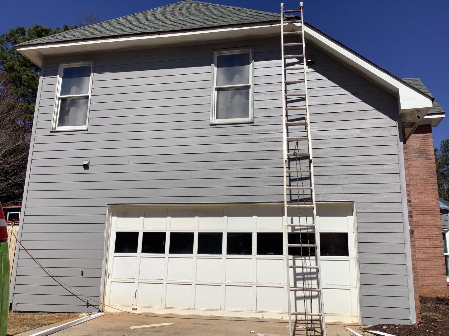Comprehensive Exterior Renovation Featuring James Hardie Siding in Suwanee by Swift Home Renovations