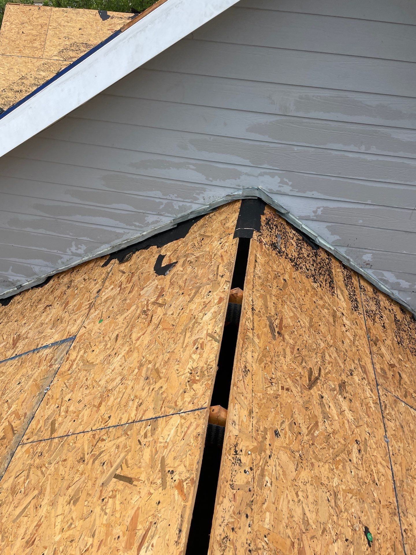 Residential Roofing Installation using GAF Timberline HDZ Pewter Gray by Rainstoppers Roofing