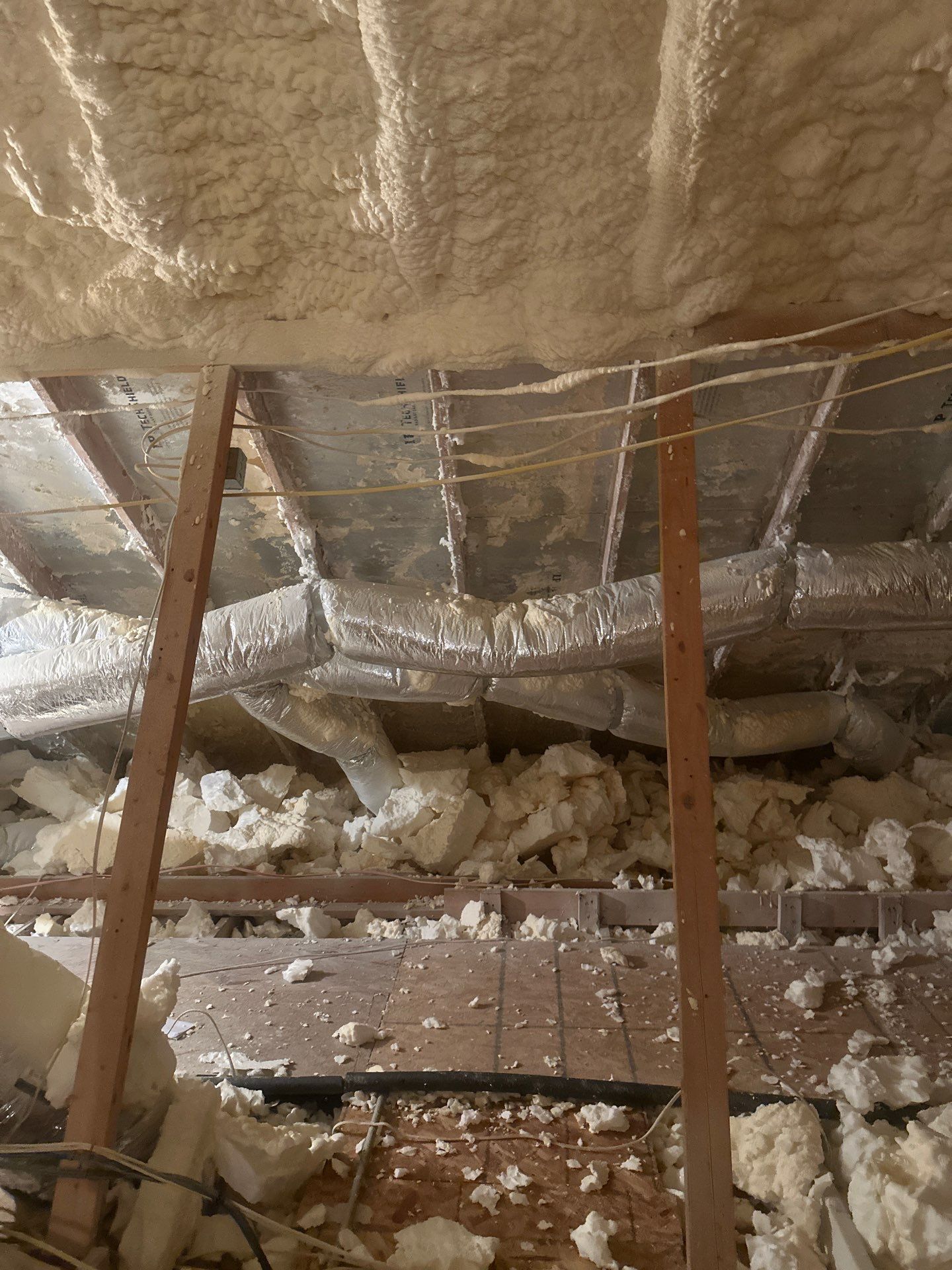 Spray foam insulation removal & re spray by Apex Insulation Solutions