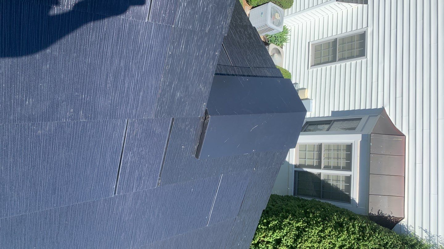 Tesla Solar Roof Replacement using Tesla Solar Roof V3 tiles by American Home Contractors