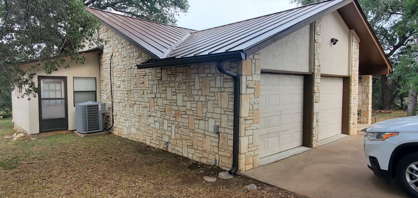 Steel Metal Roofing using McElroy Steel Standing Seam by Lightning Exteriors