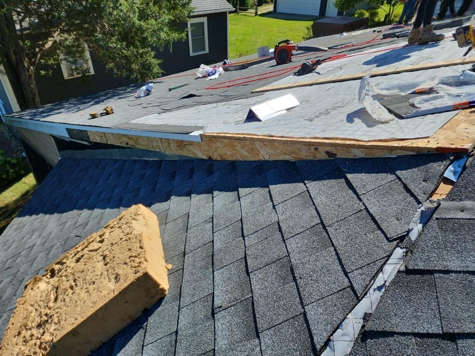 Residential Roof Installation and Skylight Replacement in Kiel, WI by Gellings Roofing & Siding