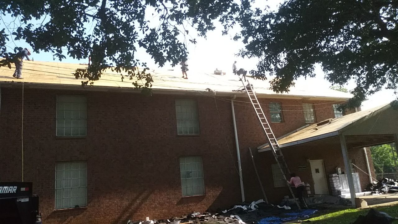 Residential Roofing Installation using Roof Replacement by American Roofing & Construction LLC