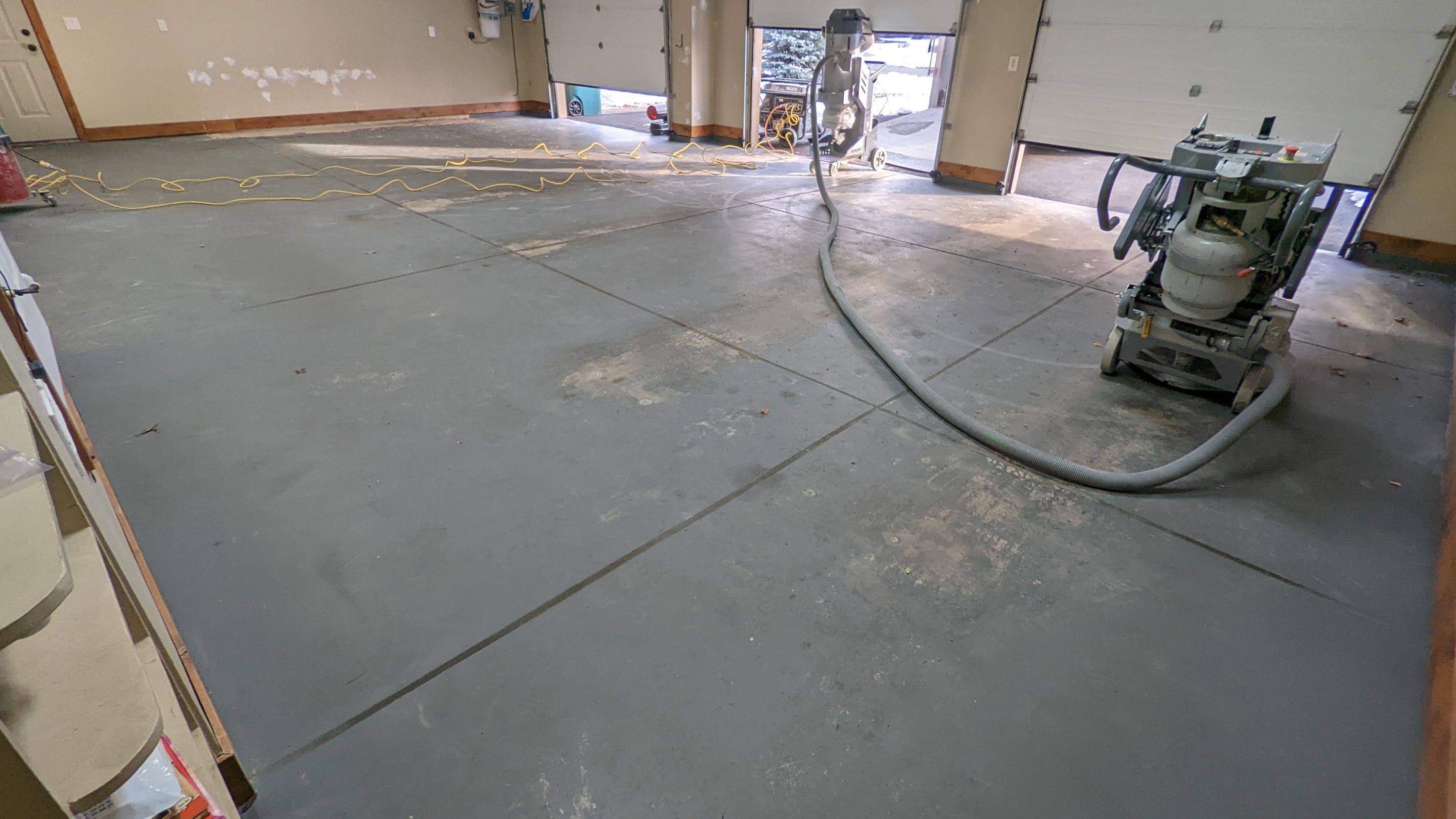 Garage Transformation using Sandstone by Croc Coatings, LLC