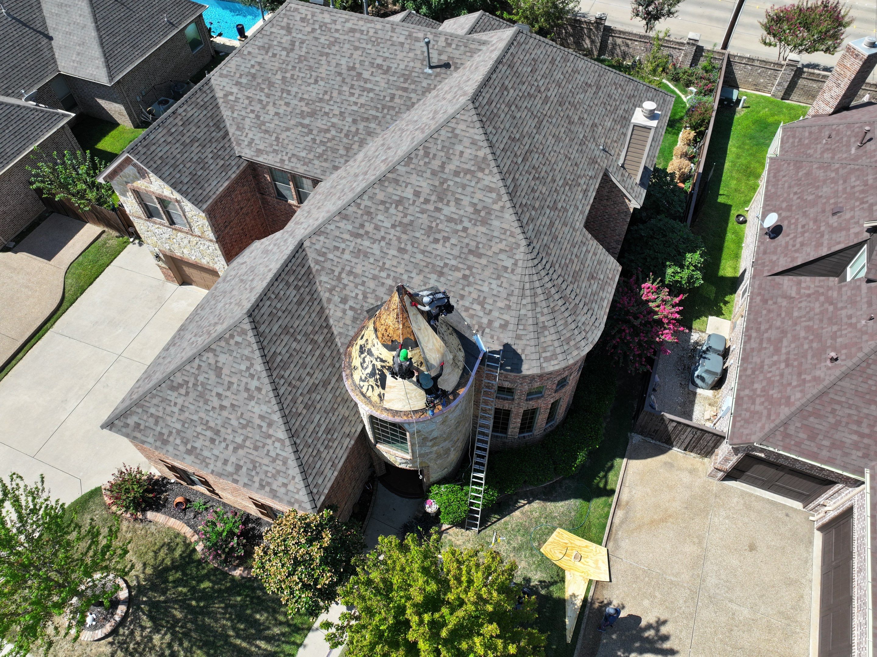 Installing Custom copper turret and Malarkey Vista Class 4 shingles Hail Damage Upgrade by Becker Roofing and Exteriors