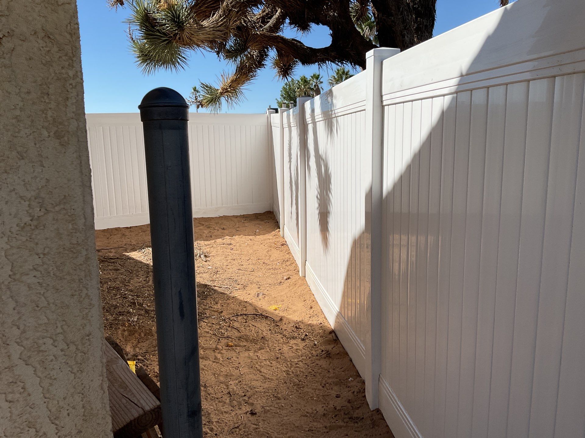 White picket fence  by Fence Guys Inc. 