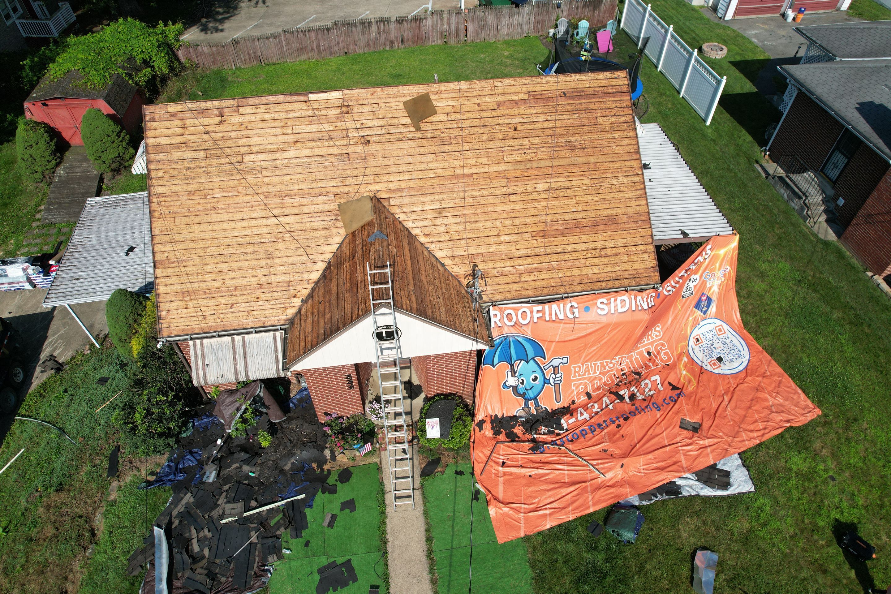 Residential Roofing Installation using GAF Timberline HDZ Pewter Gray by Rainstoppers Roofing