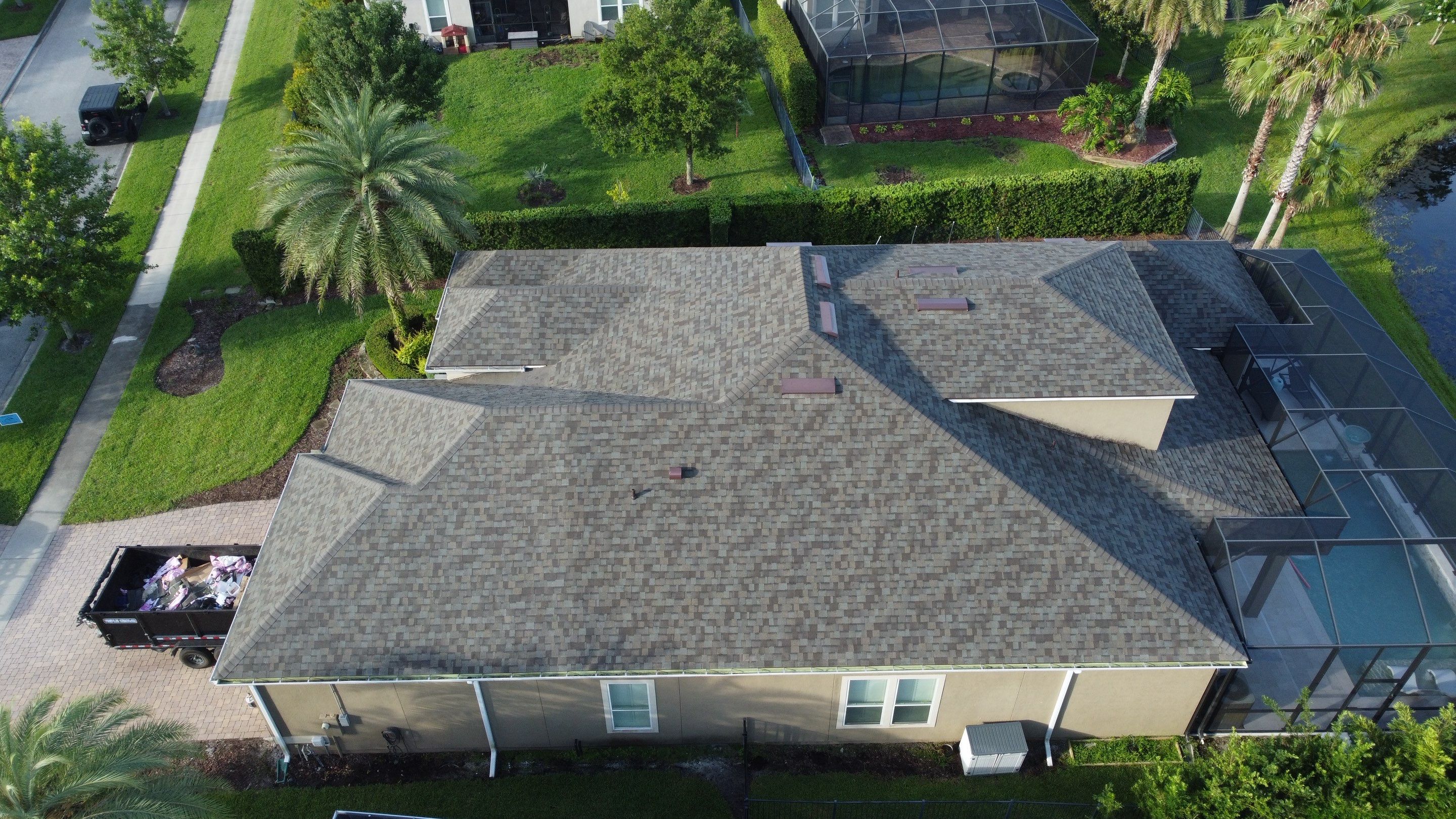 Ponte Vedra Residential Roof Replacement with Driftwood Architectural Asphalt Shingles by Trinity Restoration and Roofing LLC
