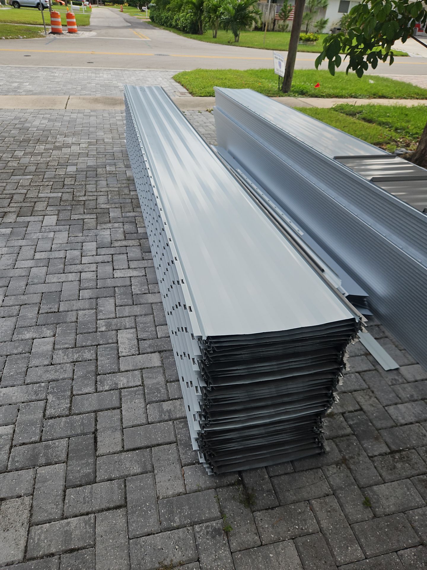 Residential Roofing Installation using 1" Nail strip metal roof by BLUES BROTHERS CONSTRUCTION CORP