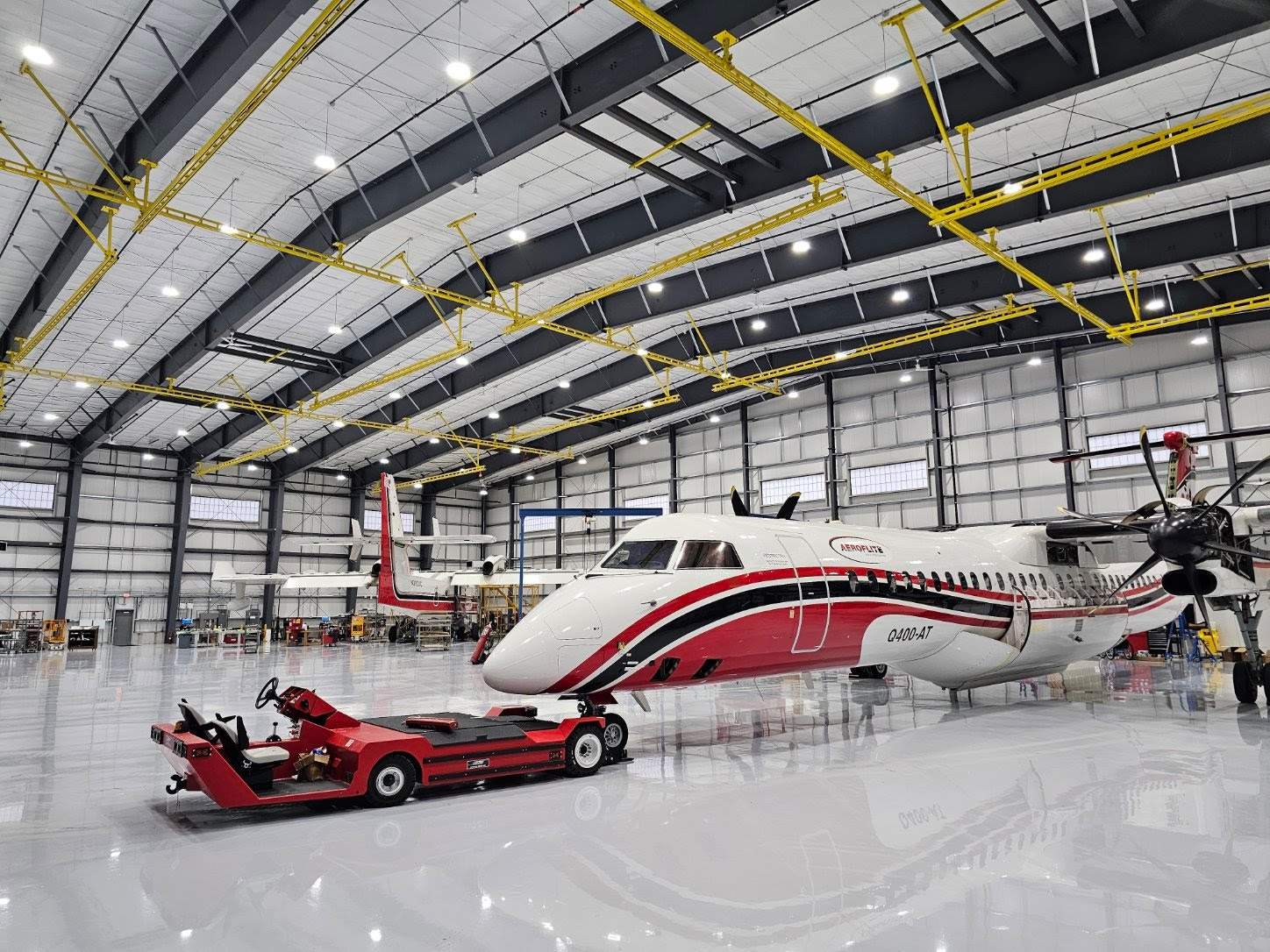 Airplane Hanger using Light Grey Commercial Penntek Epoxy by Croc Coatings, LLC
