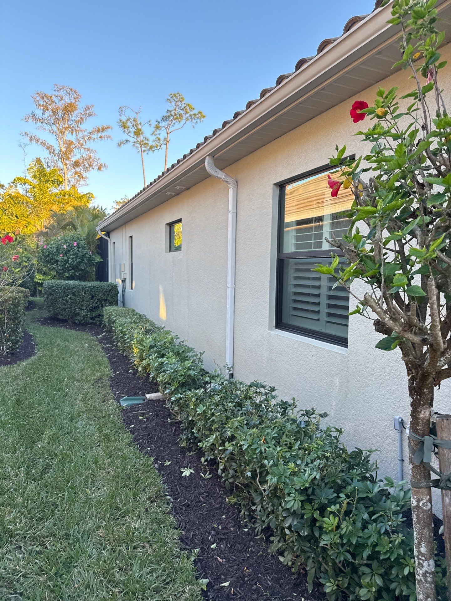 Downspouts using White Down Spouts in Fort Myers FL by Gutter Professors